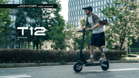 Joyor T12 electric scooter with 12-inch tires on city street