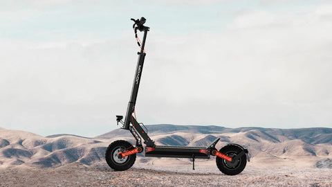 JOYOR S5-Z electric scooter rider riding on outdoor urban road scene